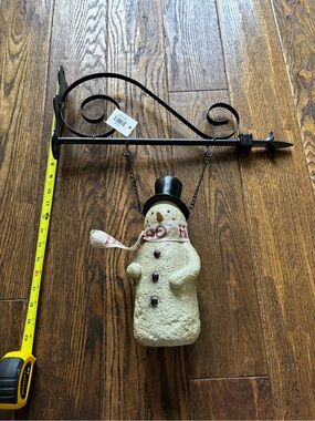 Festive Cream Snowman Hanging Decoration with Black Metal Bracket